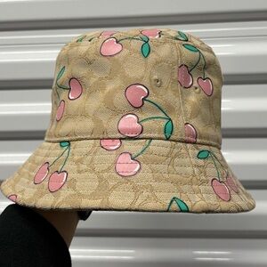 NWT limited Coach women's Signature Cherry Swirl Print Bucket